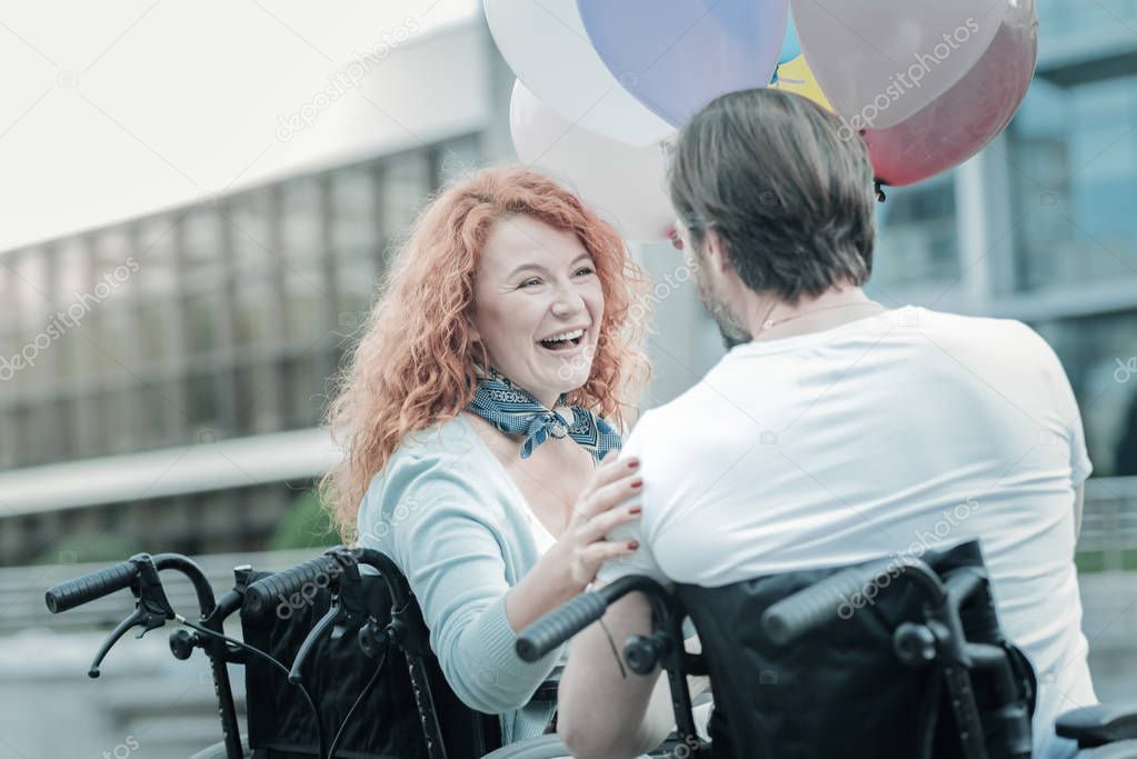 Positive female person looking at her man