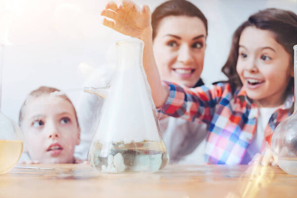 Scaled up shot of children having fun in chemistry lab