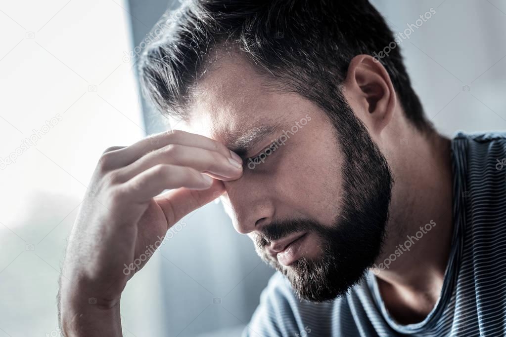 Portrait of a cheerless unhappy man