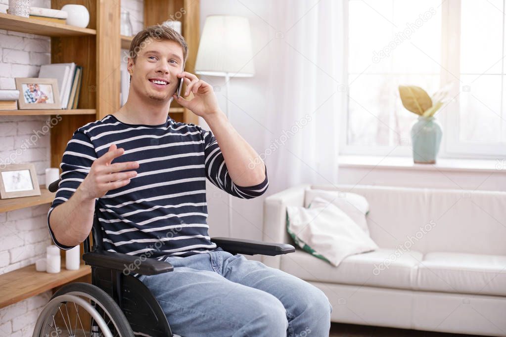 Cheerful differently abled man being high-spirited