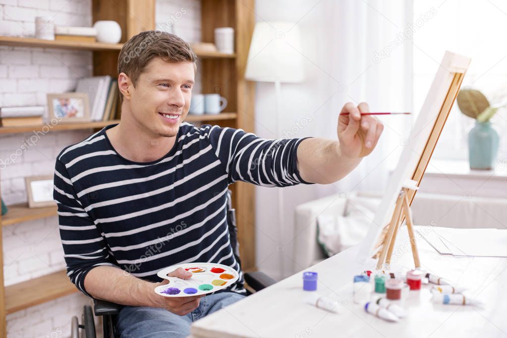 Attractive young man turning on his imagination