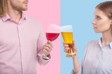 Close up of couple clinking glasses of wine and beer clipart