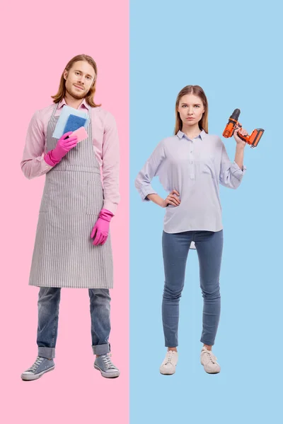 Pleasant man posing with sponges while woman holding screw gun — Stock Photo, Image