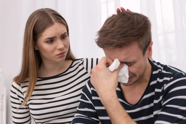 Caring woman coming her man down — Stock Photo, Image