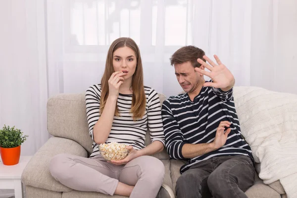 Frightened man afraid of the film — Stock Photo, Image