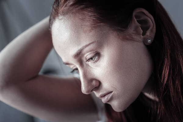 Beautiful charming woman loosing motivation