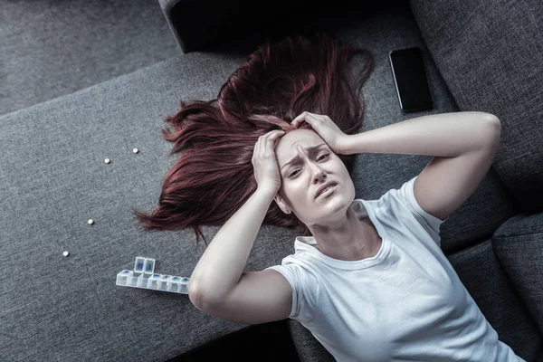 Painful worried woman experiencing side effects — Stock Photo, Image