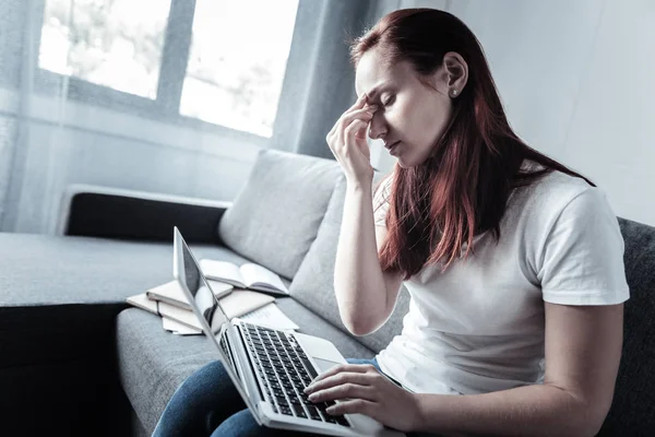 Pretty tired woman dealing with work — Stock Photo, Image