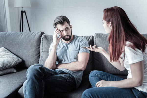 Young appealing couple arguing about relationship