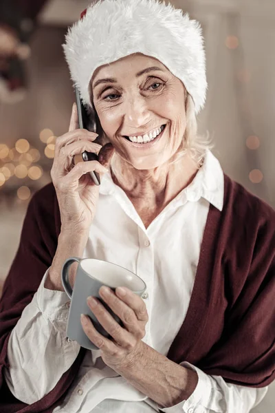 Positive delighted woman talking per telephone — Stock Photo, Image