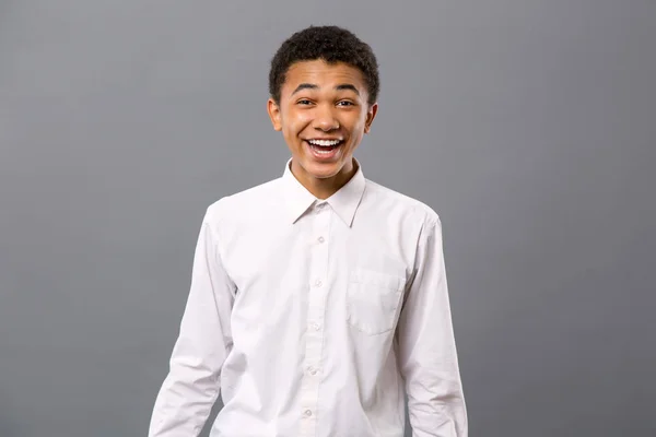 Cheerful young man smiling — Stock Photo, Image