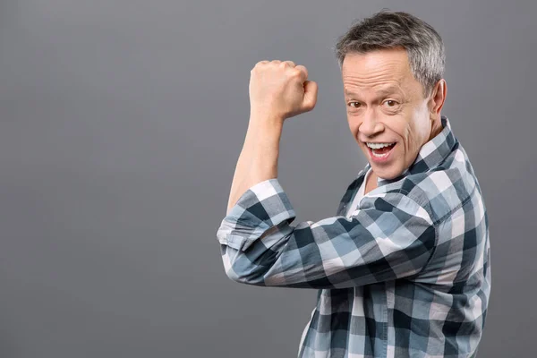 Delighted cheerful man smiling to you — Stock Photo, Image