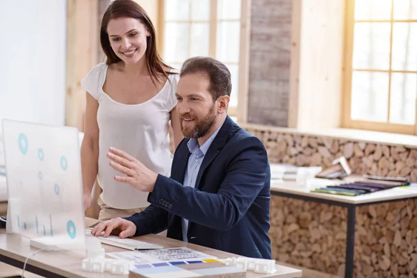 Inspired two colleagues studying graphics — Stock Photo, Image