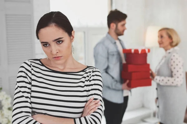 Angry unhappy woman standing cross handed — Stock Photo, Image