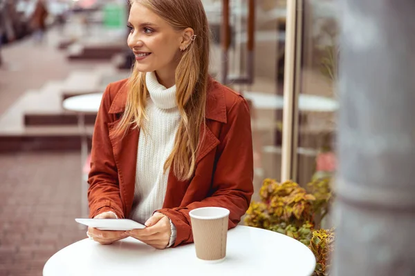 Smiling trendy pretty Caucasian girl looking away — Stock Photo, Image