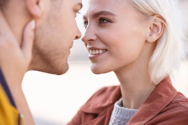 Beautiful couple going to kiss for the first time — Stock Photo, Image