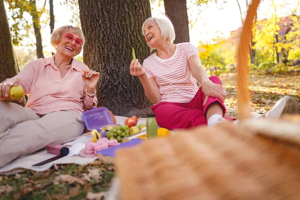 Cheerful ladies having fun talking about their health — 스톡 사진
