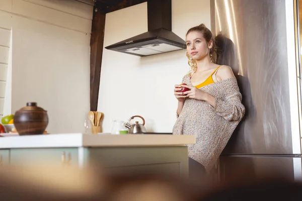 Attractive blonde woman being deep in thoughts — Stock Photo, Image