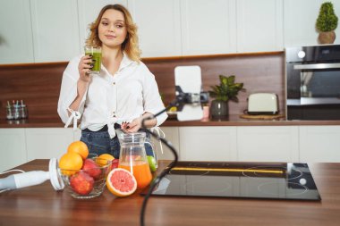 Charming curly haired girl shooting new video
