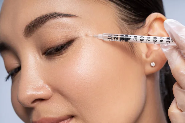 Close up of pretty woman that doing beauty injections — Stock Photo, Image