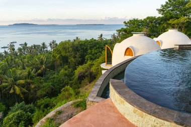 Luxury resort in jungles above seashore stock photo