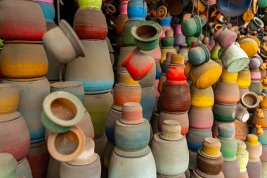 Close up of clay pots being on the showcase