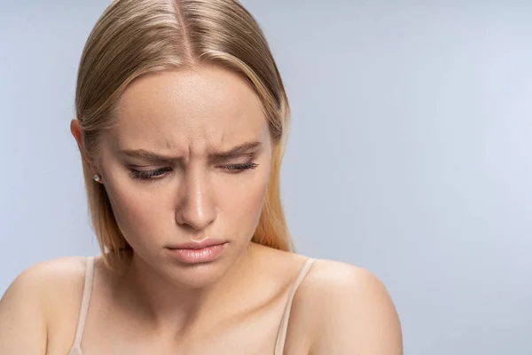 Frustrated Caucasian girl with a sad expression — Stock Photo, Image