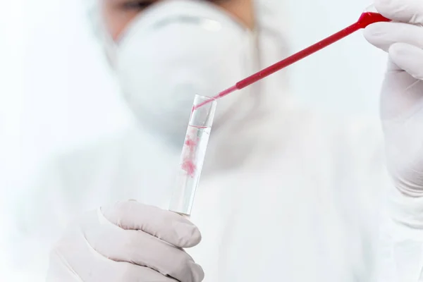 Close up of male hands that holding test tube — Stock Photo, Image