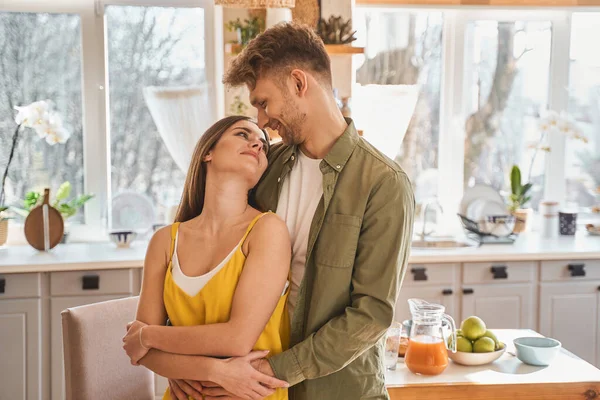 Kind brunette female looking at her man — Stock Photo, Image