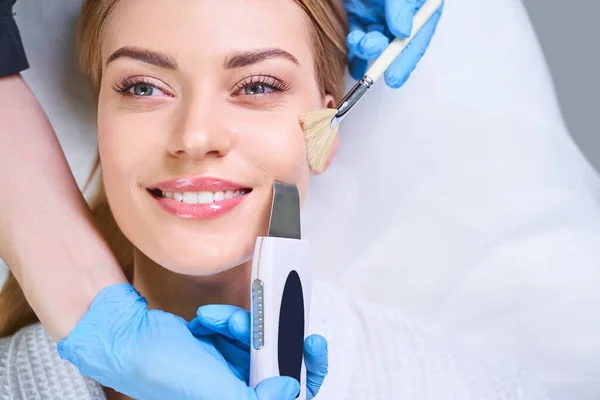 Smiling pretty woman during facial stock photo — Stock Photo, Image