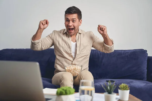 Excited middle-aged fan supporting his favorite team — Stock Photo, Image