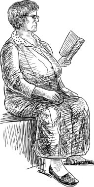  yaşlı kadın bir kitap okur