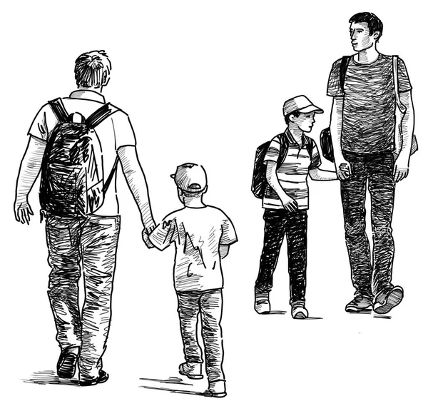 Ojcowie z dziećmi na spacer — Zdjęcie stockowe
