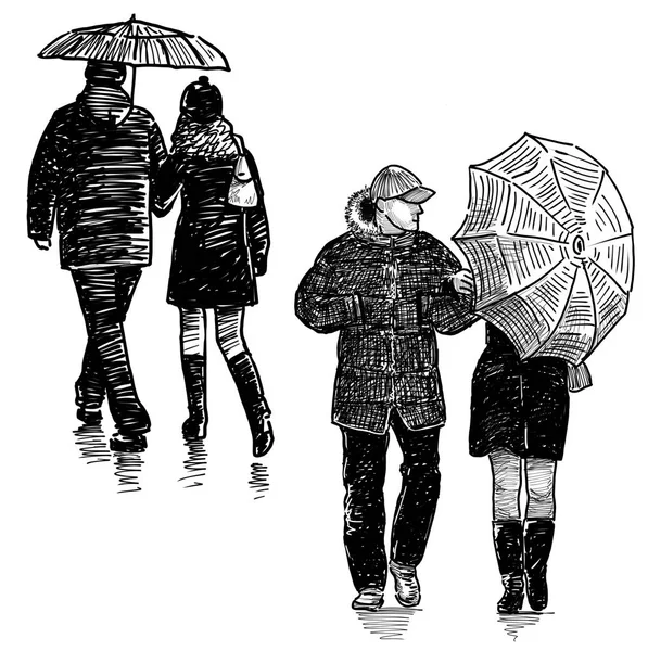 Townspeople under umbrellas — Stock Photo, Image