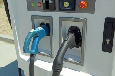 Electric Vehicle charging sign, a power source eventually expected to replace fossil fuels such as gasoline and oil in operating a car and other motor vehicles clipart