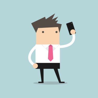 Bir cep telefonu kullanarak selfie alarak iş adamı