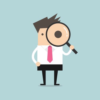 İş adamı büyüteçle bakıyor