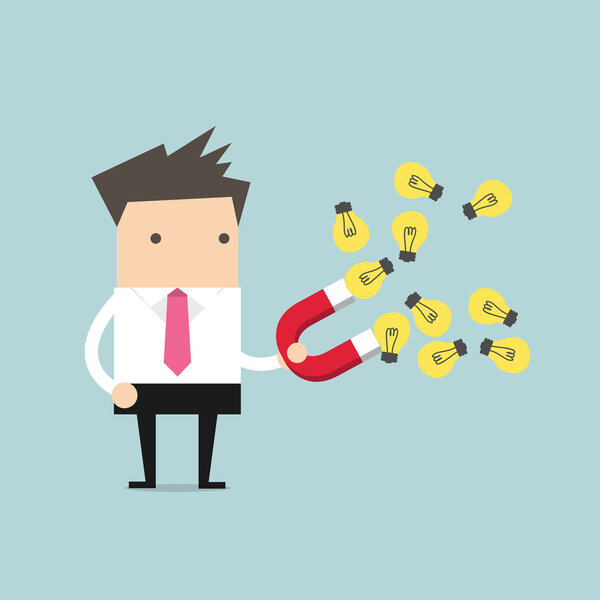 Бизнесмен с подковообразным магнитом собирает лампочку
