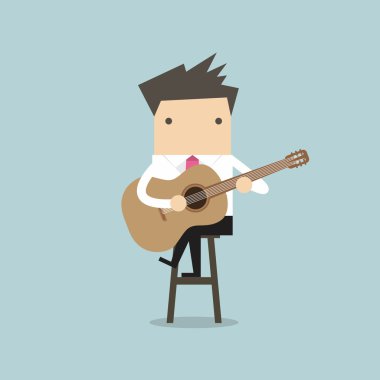 İşadamı bir sandalyenin üstüne gitar çalmak.