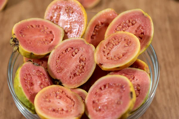 Guava fruits (Psidium guajava). Guava is the fruit of guava, a tree of the species Psidium guajava, of the Myrtaceae family, originally from tropical America. It occurs mainly in Brazil and the Antilles