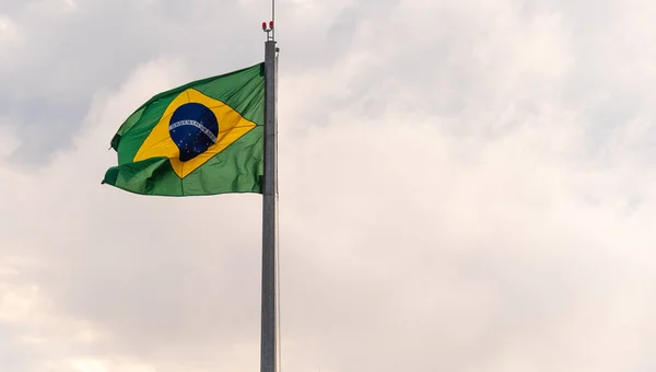 Brazil\'s flag. Pavilion. symbol of the republic. National symbols. flag flying. The National Flag is one of the national symbols of a country.