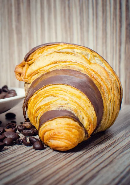 Chocolate croissant with coffee — Stock Photo, Image