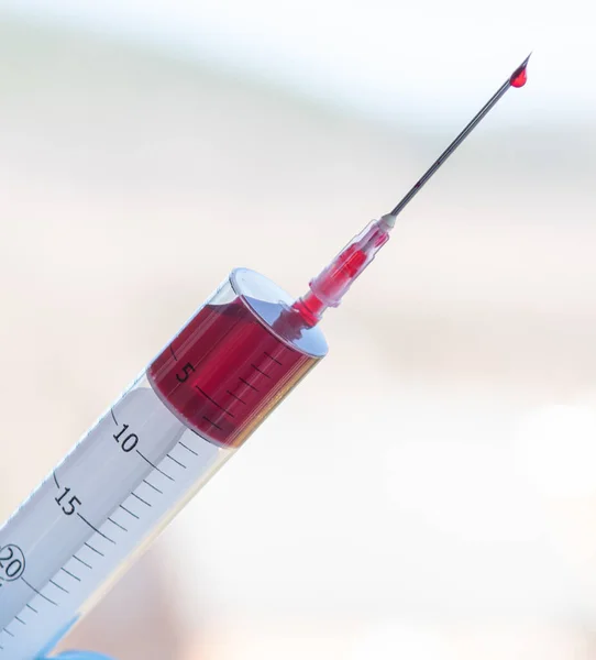 Injection Syringe Blood Gloved Hand — Stock Photo, Image