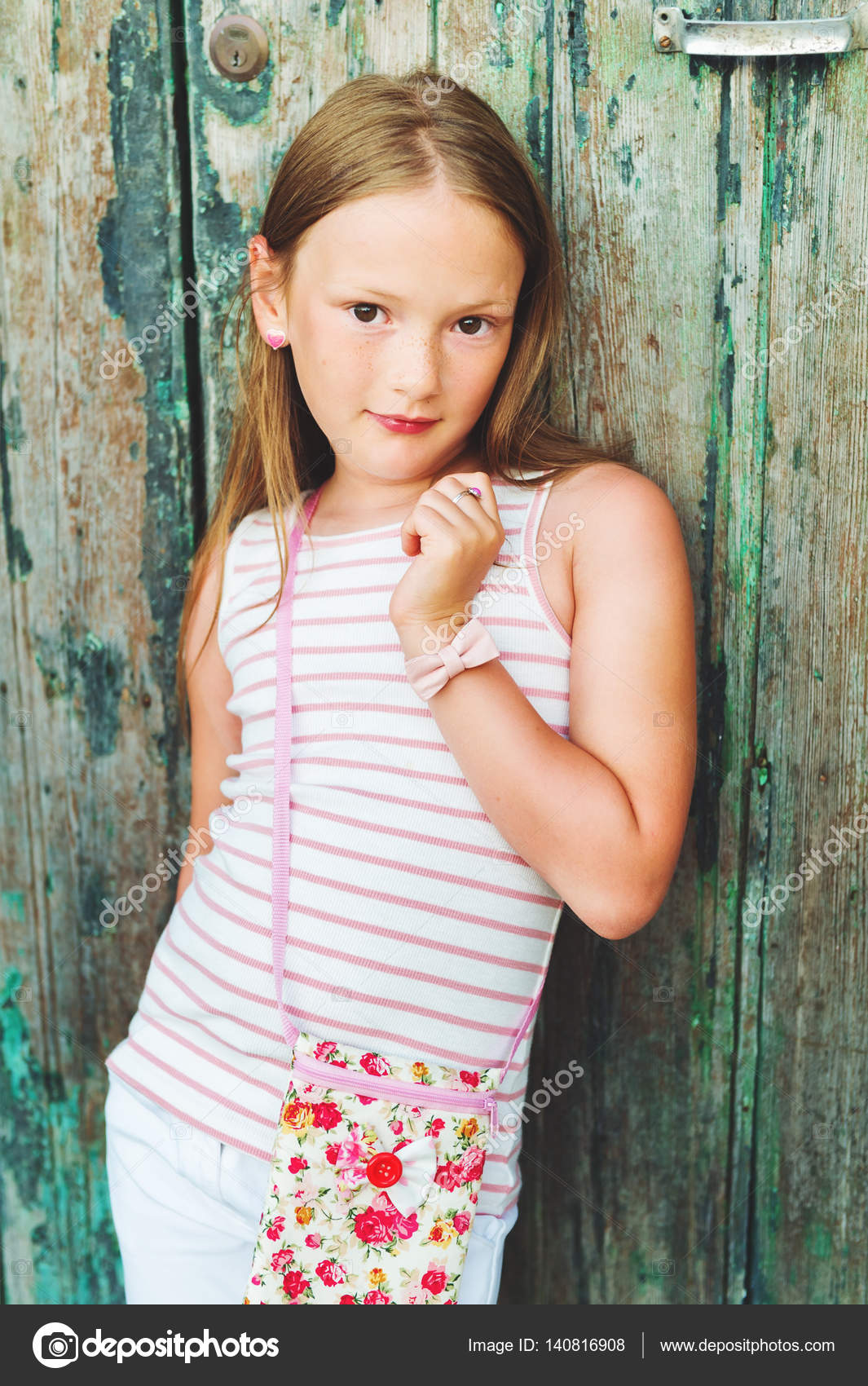 Vertical portrait of a cute little 7-8 year old girl wearing many  accessories Stock Photo by ©annanahabed 140816908, 8 Year Old Girl