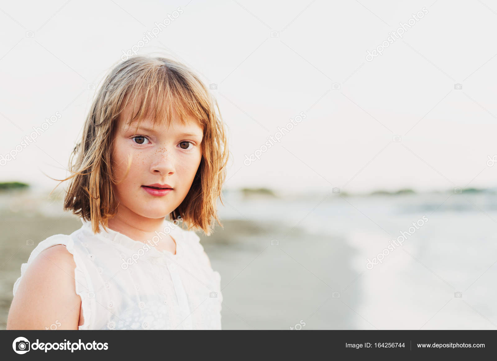 Close Up Portrait Of Sweet Little Girl With Short Bob