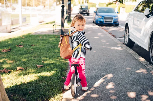 Outdoor Portrait Cute Little Toddler Girl Riding Bike Wearing Backpack — Stock Photo, Image