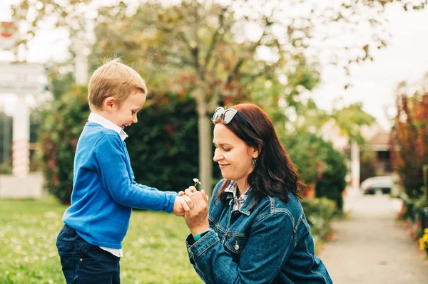 Little Boy Offering Flowers His Lovely Mom Happy Parenthood — Stock Photo, Image