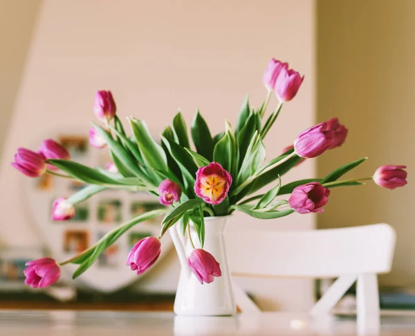 Beautiful Bouquet Fresh Purple Tulips Jug Placed White Table Living — Stock Photo, Image