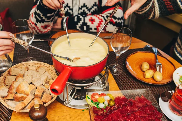 Friends Eating Cheese Fondue Cozy Traditional Swiss Restaurant — Stock Photo, Image