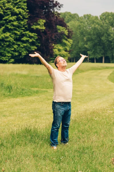 Happy Middle Age Man Enjoying Nice Day Summer Park Holding — Stock Photo, Image